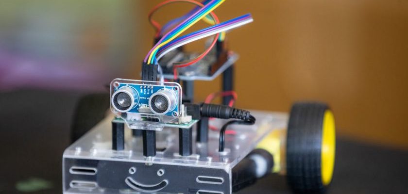 Automotive Robotics - A small robot with wires and a camera on top