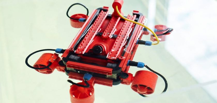 Industrial Robotics - Robot made with 3d printer with cables and wires against white background